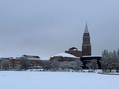 Kleiner Kiel covered in snow and the town hall tower