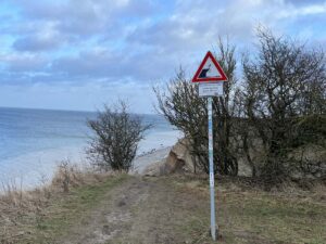 Steep coast Stohl warning sign danger of demolition