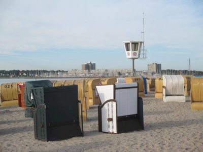 Beach chairs on the beach in Strande